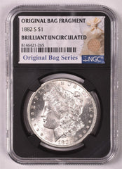 1882-S Morgan Dollar - NGC Brilliant UNC - Relic Bag Label Stock Photos