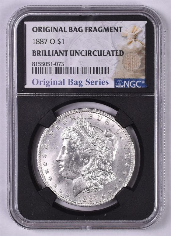 1887-O Morgan Silver Dollar - NGC Brilliant UNC - Relic Bag Label Stock Photos