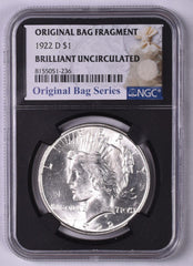 1922-D Peace Silver Dollar - NGC Brilliant UNC - Relic Bag Label Stock Photos