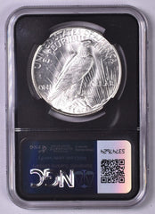 1922-D Peace Silver Dollar - NGC Brilliant UNC - Relic Bag Label Stock Photos