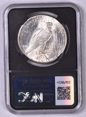 1923-D Peace Silver Dollar - NGC Brilliant UNC Relic Bag Label Stock Photos