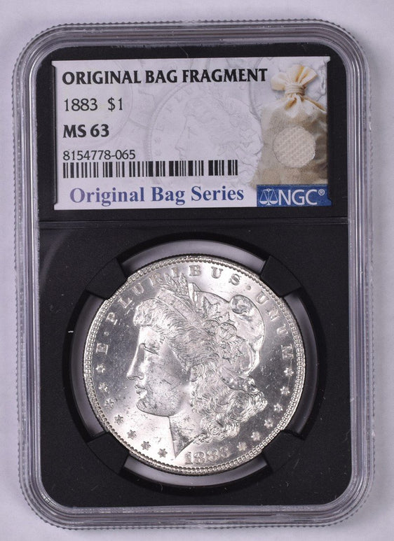 1883 Morgan Silver Dollar - NGC MS63 - Relic Bag Label Stock Photos